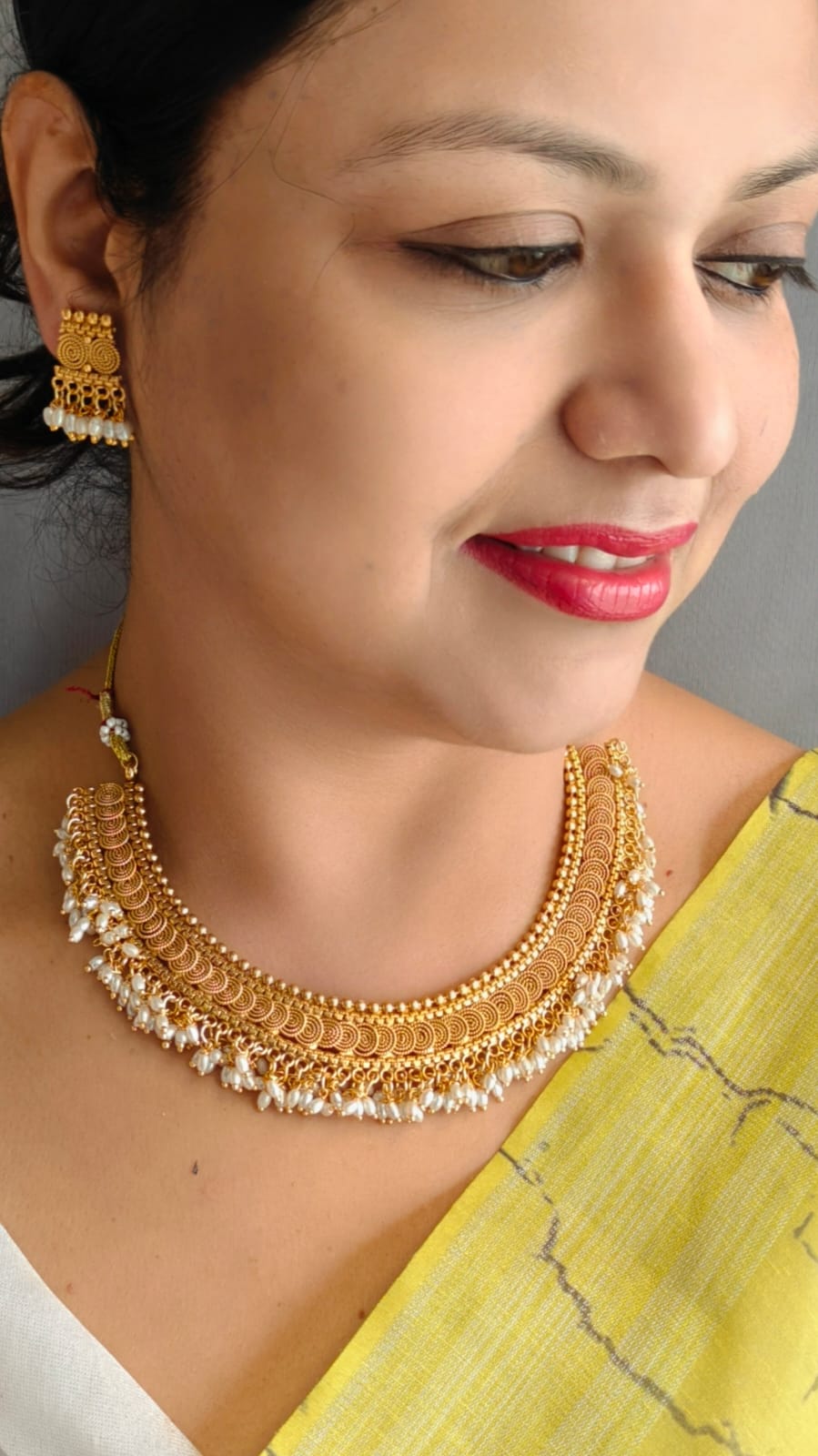 Necklace in temple pattern with pearls