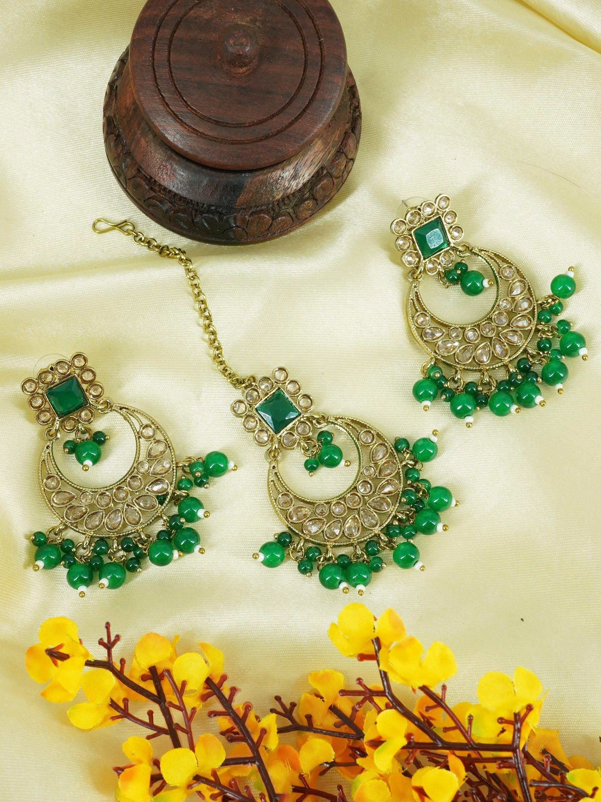 Faint gold finish Earring/jhumka/Dangler with Mang Tikka with Irish Green Color Stones 11764N - Griiham