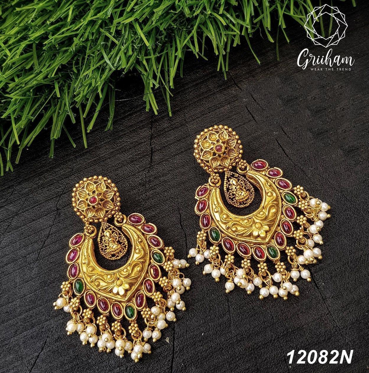 Gold plated Temple design Jhumka Earrings - Griiham