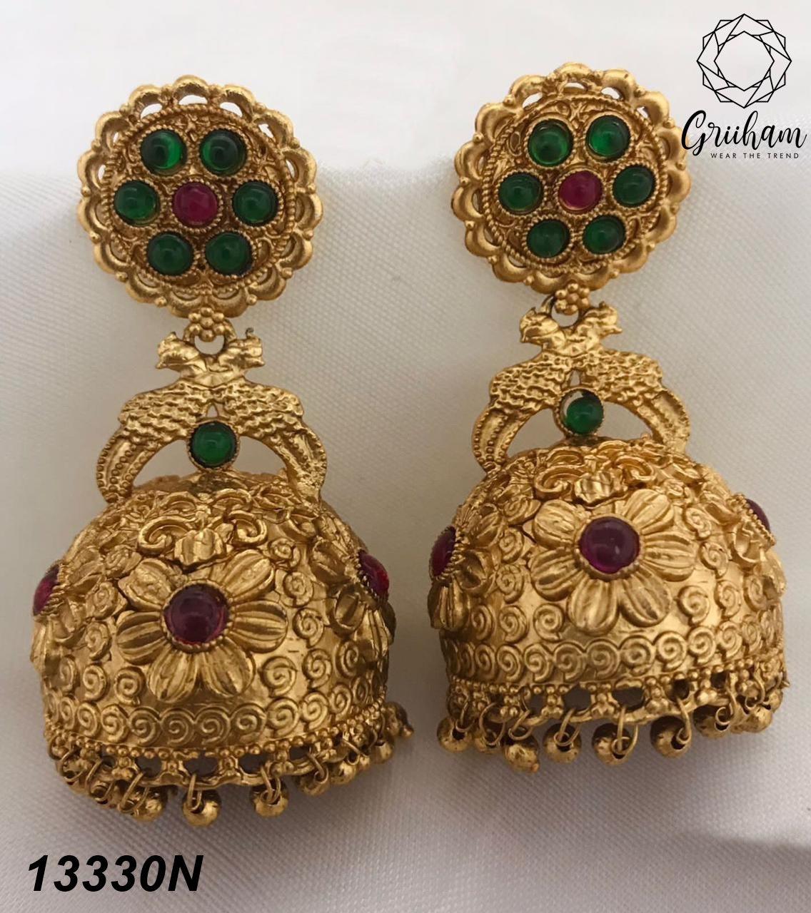 Gold plated Temple design Jhumka Earrings - Griiham
