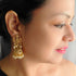 Gold plated Temple design Jhumka Earrings - Griiham