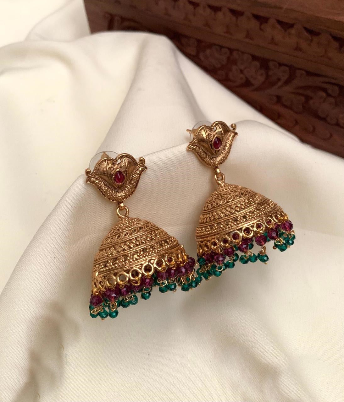 Gold plated Temple design Jhumka Earrings